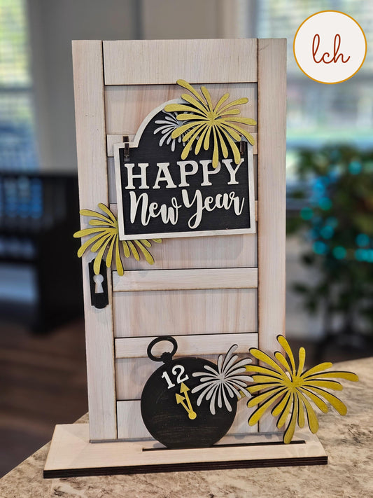 Wooden sign post insert with Happy New Year message and yellow fireworks decoration