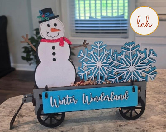 Handcrafted snowman decor for shelves wooden winter wonderland display with snowflakes and wagon design