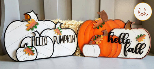 Decorative wooden fall pumpkins with Hello Pumpkin and Hello Fall text for autumn decor
