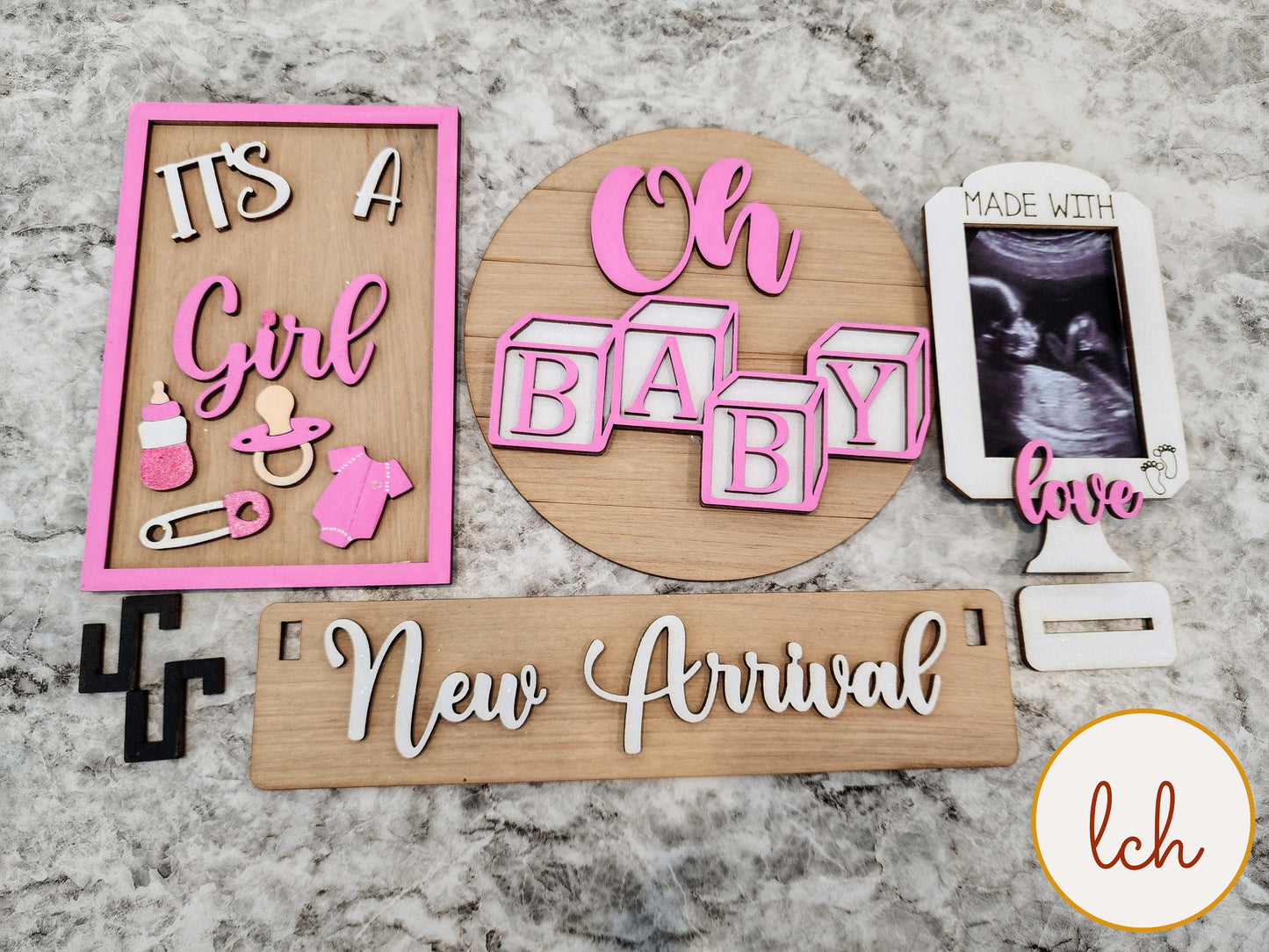 Wooden wagon insert set with baby girl theme including It’s a Girl, Oh Baby blocks, New Arrival sign, and ultrasound photo frame
