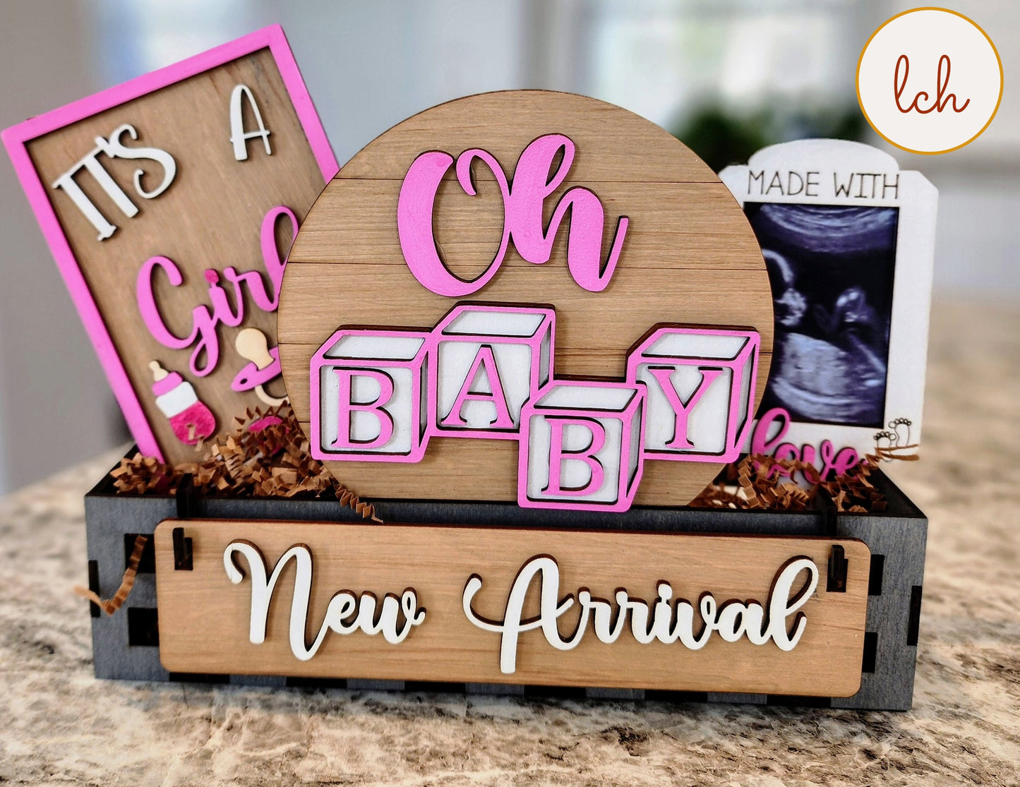 Wooden wagon insert with Oh Baby blocks and New Arrival sign for baby announcement