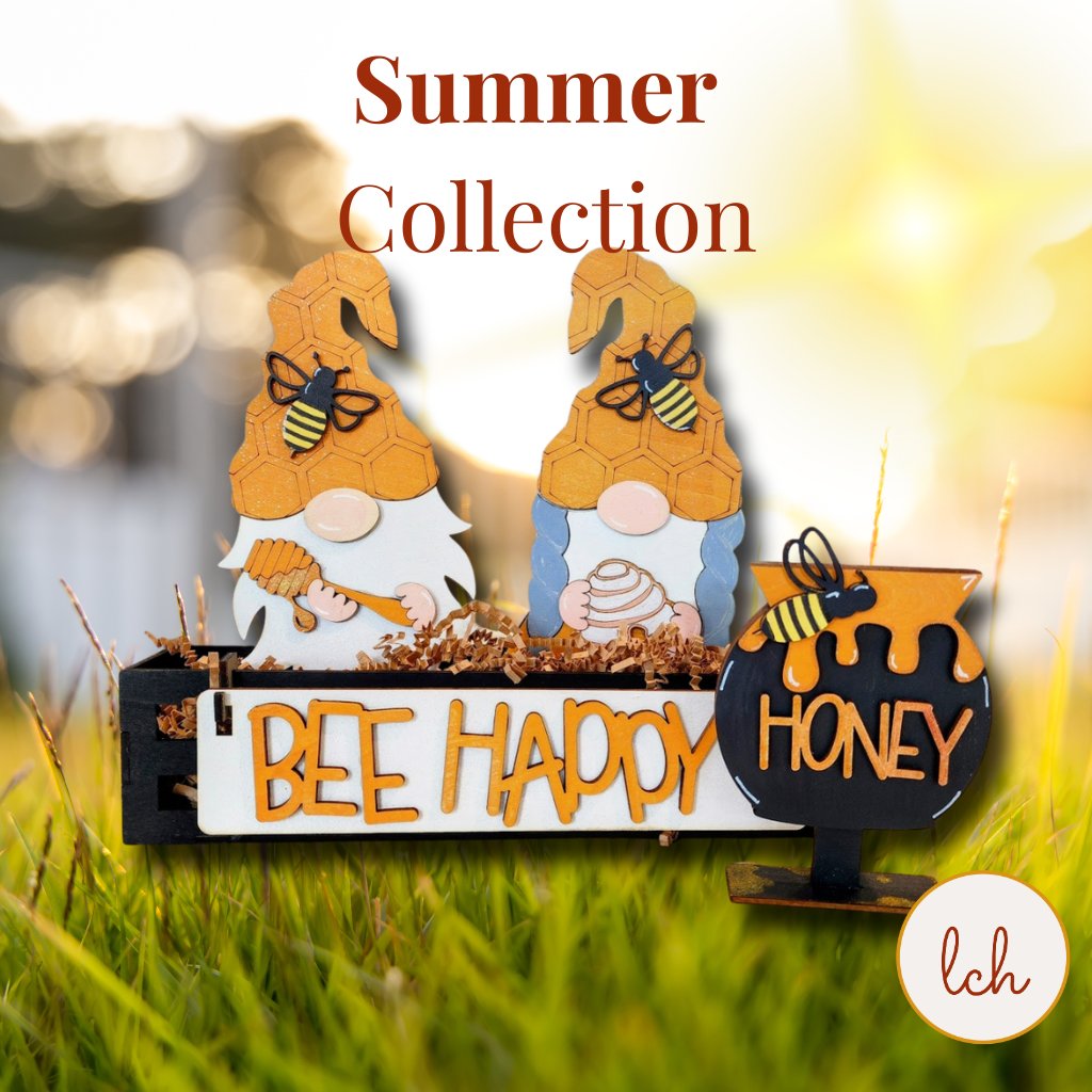 Laser engraved summer decorations featuring fresh lemon designs on wooden signs and a wagon display