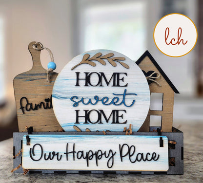 Wooden wagon insert with farmhouse decor including Home Sweet Home round sign and Our Happy Place sign