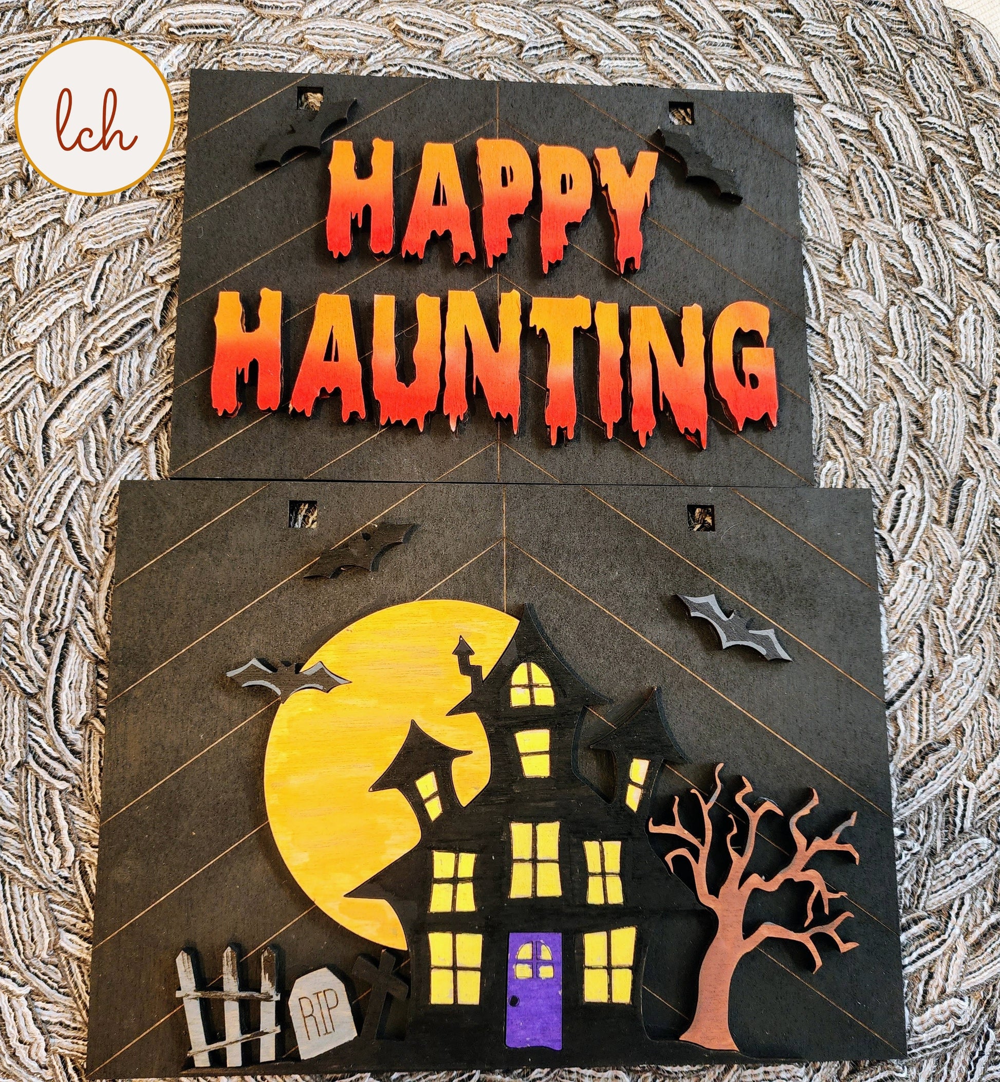 Halloween wooden ladder picture frame with haunted house, moon, tree, bats, and Happy Haunting text