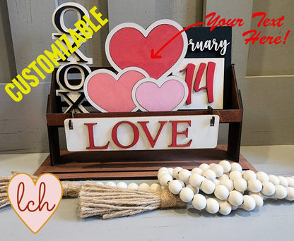 Customizable wooden wagon insert with Valentine's Day themed decorations including hearts and love sign