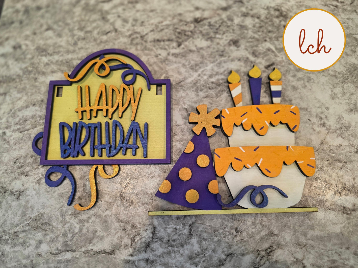 Wooden sign post insert with Happy Birthday design featuring a cake with candles and a party hat