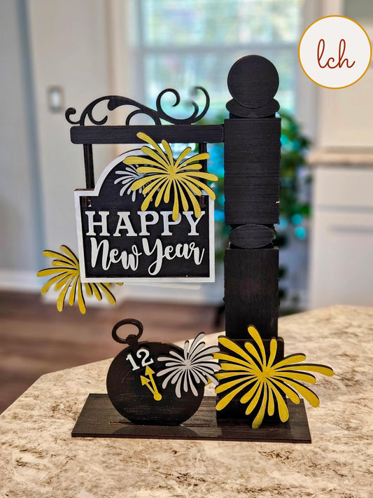 Happy new year wooden sign insert with fireworks and clock design on black wooden post