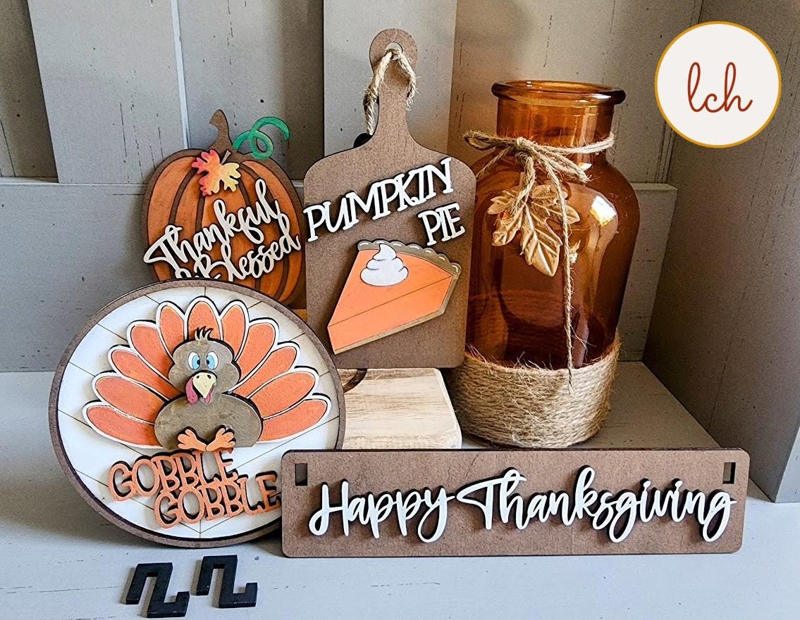 Wooden wagon insert with Thanksgiving-themed decorations including turkey, pumpkin pie, and Happy Thanksgiving sign