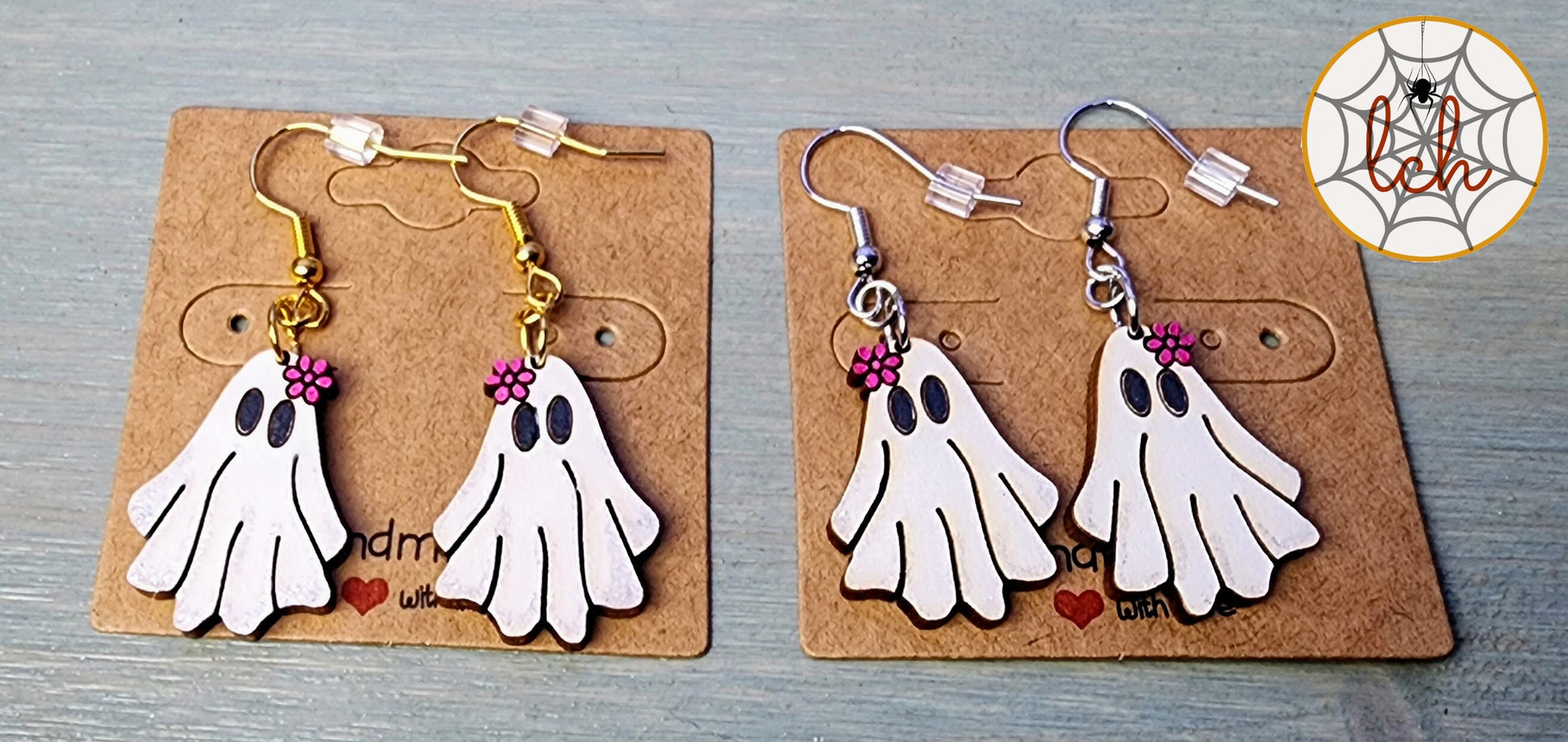 Cute ghost earrings with pink flower detail available in gold and silver hooks