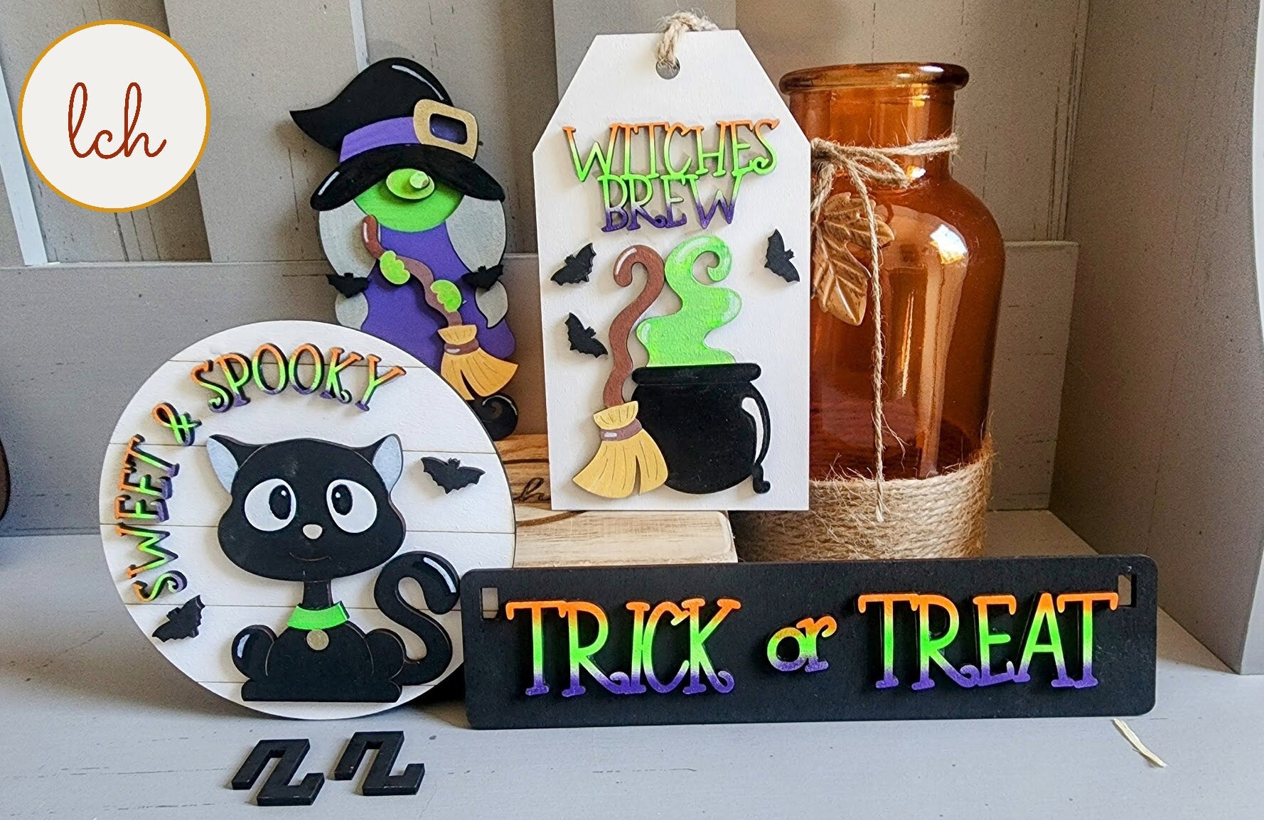 My Store wooden wagon insert with Halloween designs including black cat, witch brew, and trick or treat signs