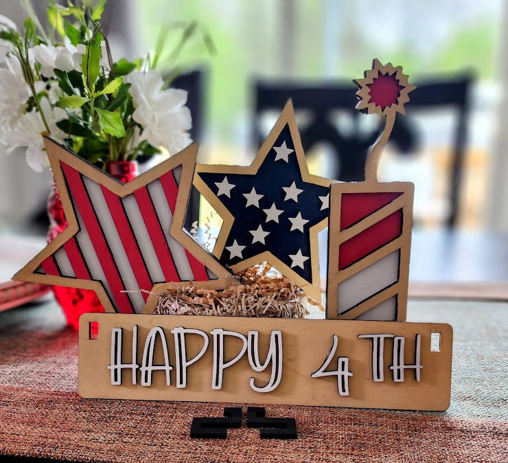Wooden 4th of July decor insert with stars and stripes design and happy 4th message
