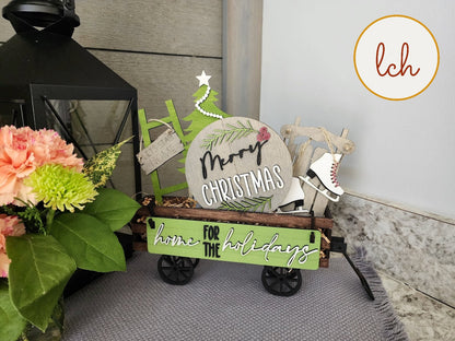 Wooden Christmas shelf sitter insert for farmhouse decor with holiday sign and ice skate in wagon