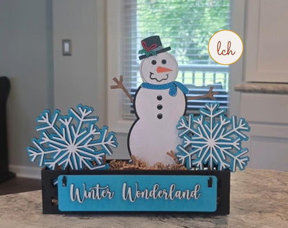 Handcrafted snowman decor for shelves with blue snowflakes and Winter Wonderland sign wooden holiday decoration