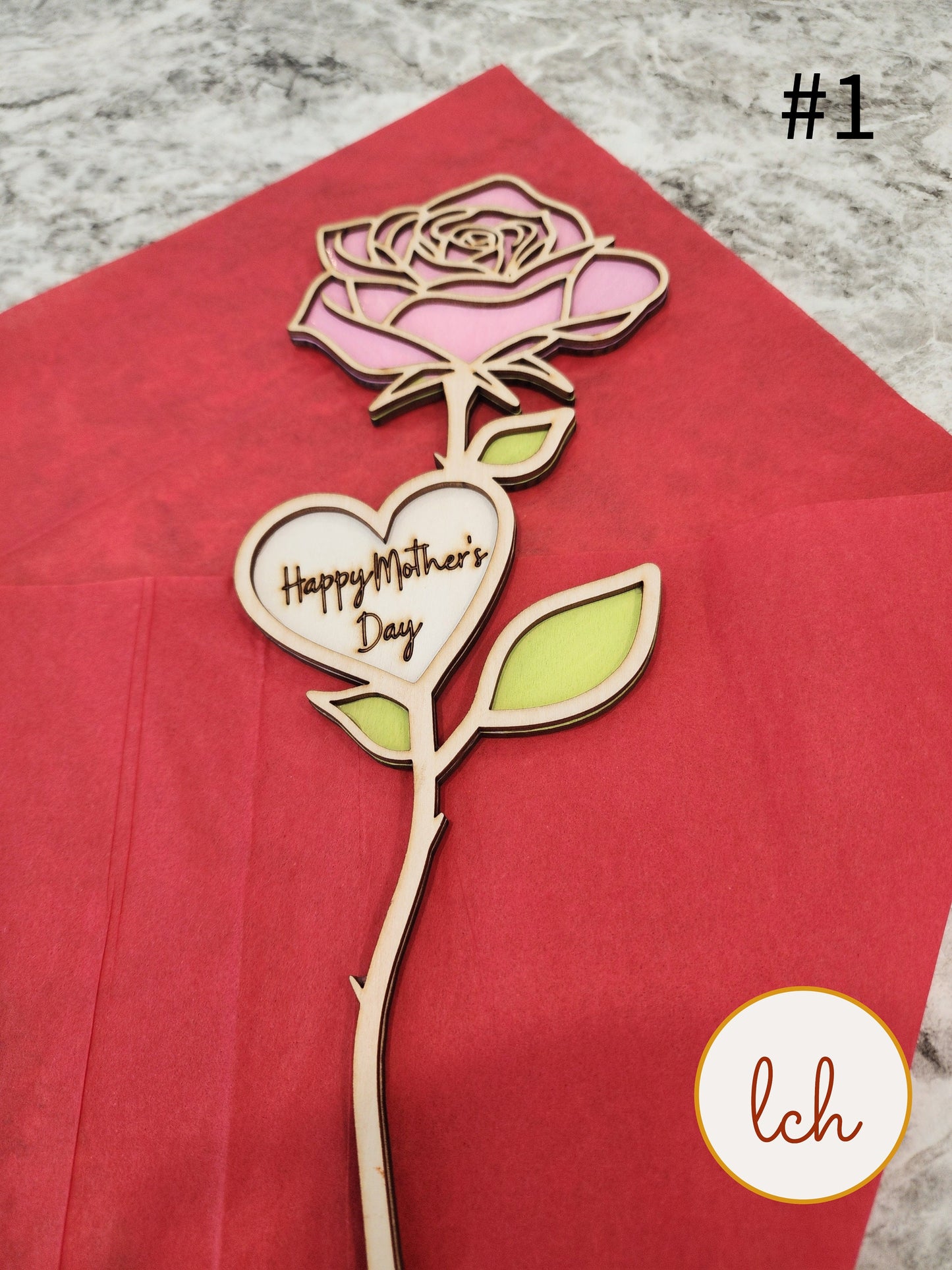 Mother's Day wooden gifts wooden rose with heart shaped Happy Mother's Day message on red background
