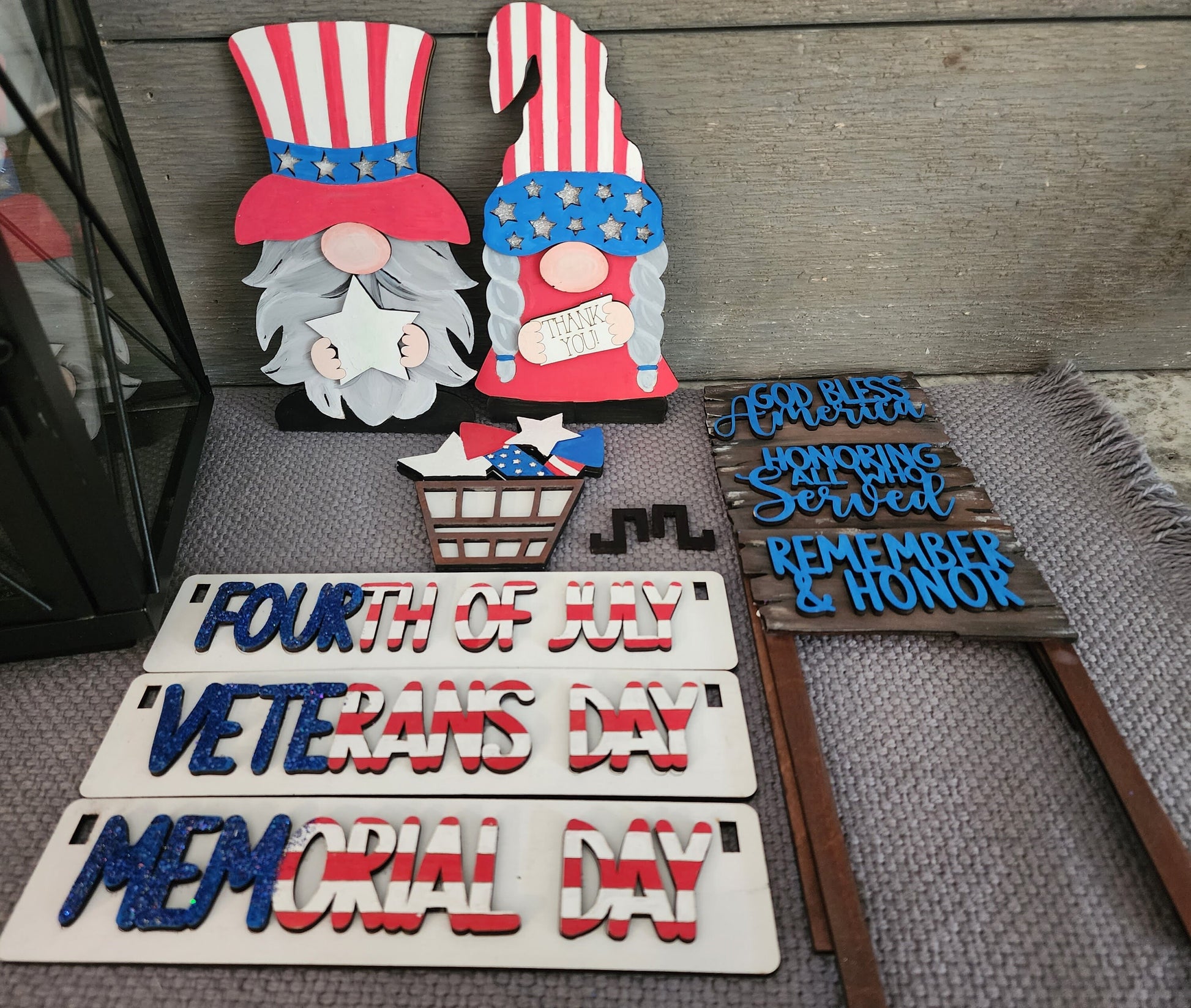 Wooden wagon insert with USA holiday mantel decoration featuring Fourth of July Veterans Day and Memorial Day signs
