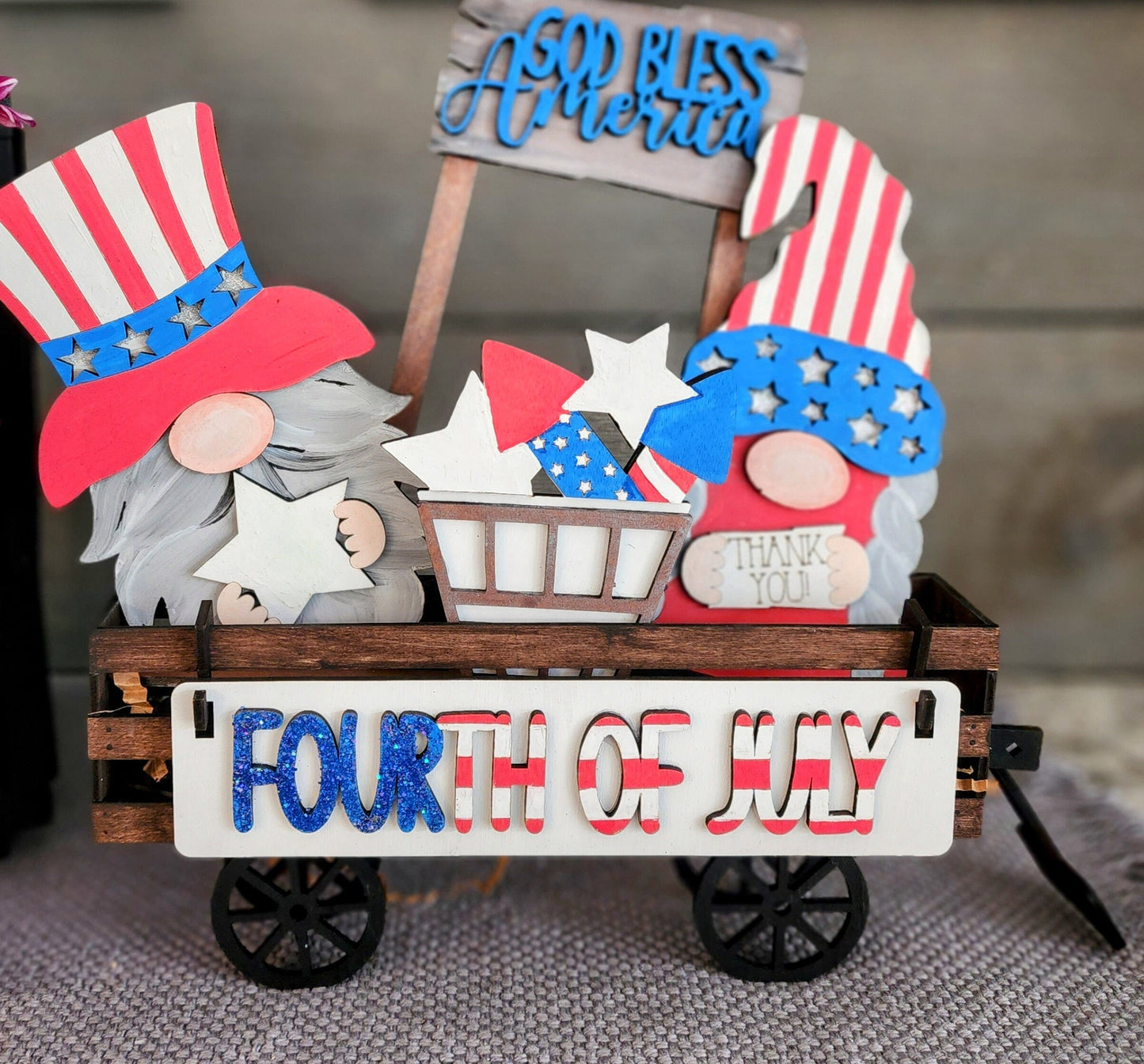 Wooden wagon insert with Fourth of July design featuring patriotic gnomes and USA holiday mantel decoration