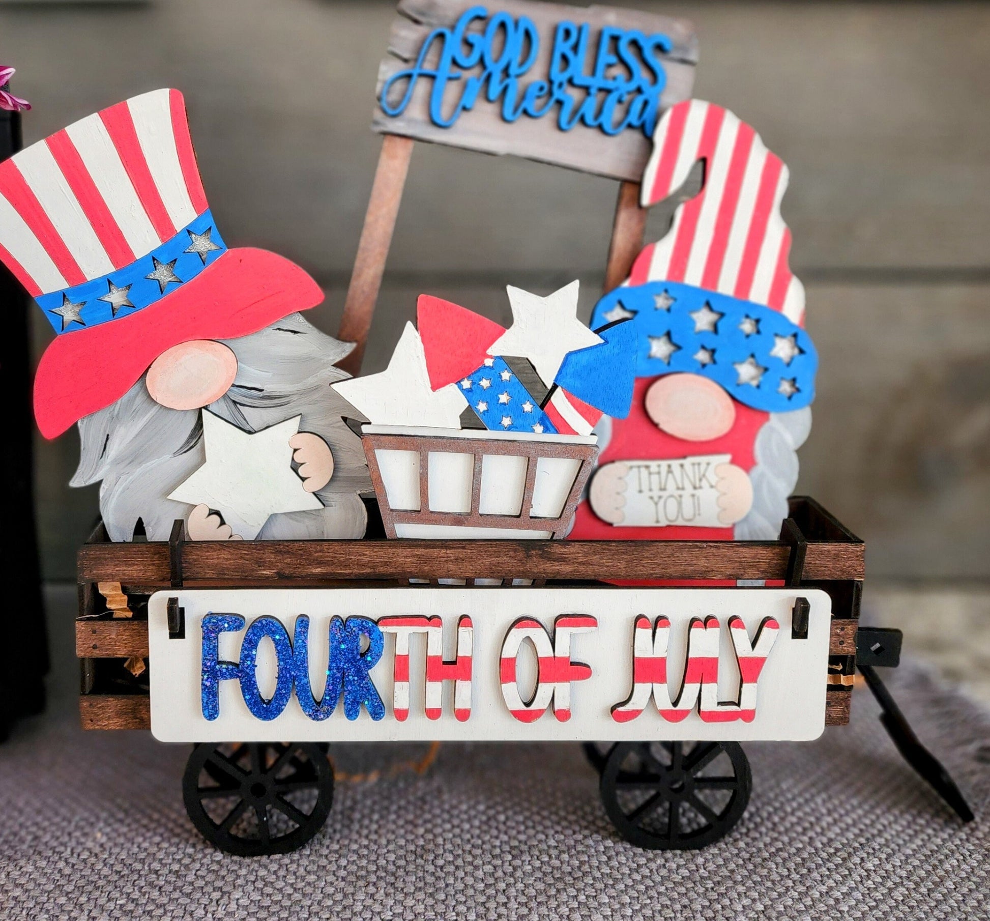 Wooden wagon insert with Fourth of July design featuring patriotic gnomes and USA holiday mantel decoration