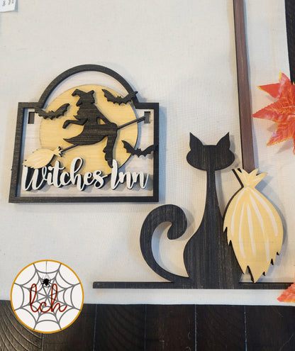 Wooden Halloween decoration with witch on broomstick and black cat with broomstick wall art