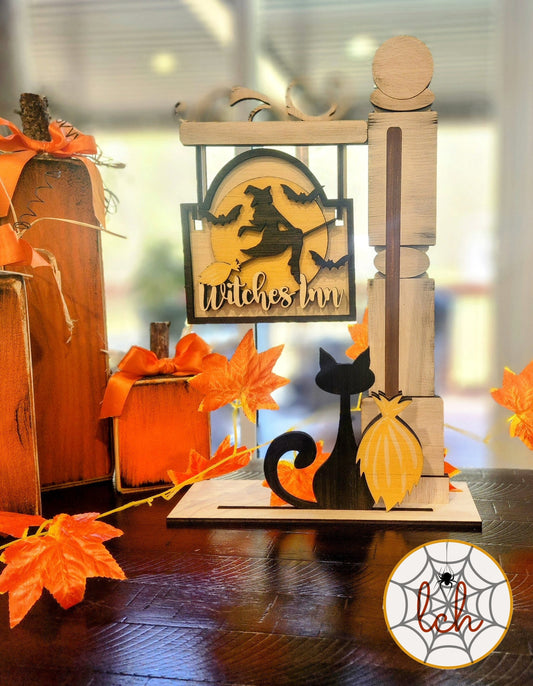 Wooden Halloween decoration featuring a witch silhouette, black cat, and orange leaves from My Store